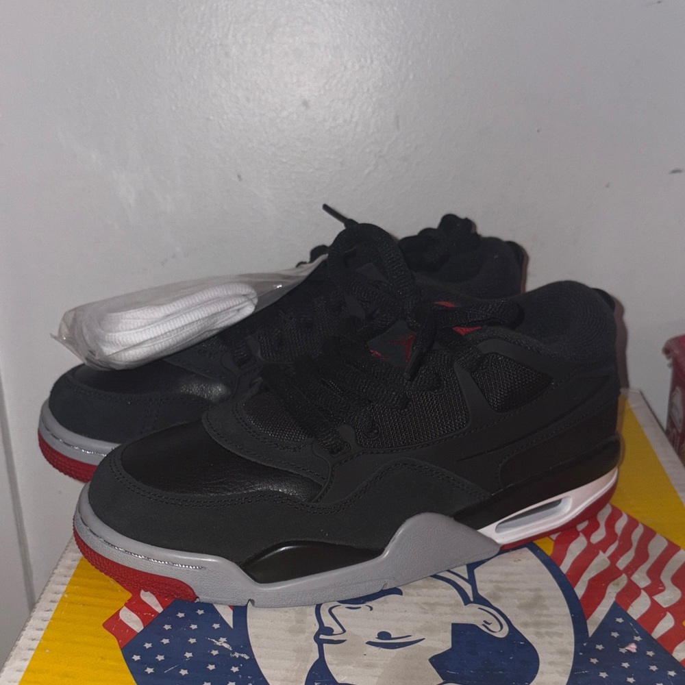 Jordan Black Sneakers with Red Jumpman Detail size 5Y